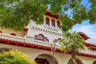 “L’Amour” is French for “love” or “the love.”