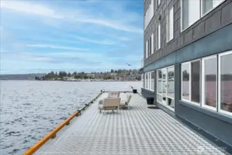Step directly onto the building's private waterfront dock — an extraordinary shared amenity that puts Lake Washington literally at your feet. Launch a kayak, tie up a boat for the day, take a swim, or simply settle in and soak up the sweeping views of the open water and Kirkland marina. This is the kind of amenity that defines a lifestyle, not just a home.