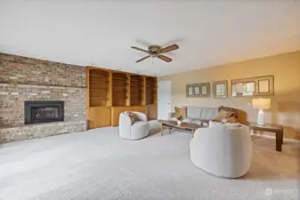 Second living room could be your designated TV room or sitting area, with built-ins and a gas fireplace.