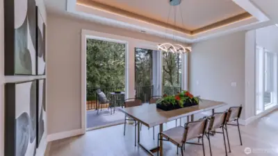 Spacious dining room adjacent Great Room. (photo is of the Model Home).