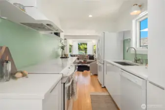 Crisp and clean and a very efficient layout make this a dreamy kitchen that will elicit comments from your guests.