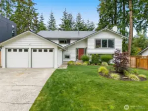 The exterior has been painted and landscaping has been meticulously maintained;  carport has been turned into a 2 car garage,