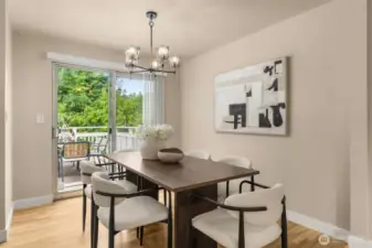 Large open dining area flows onto deck