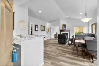 View from opening the front door, welcoming you in to the open and spacious floor plan of the home