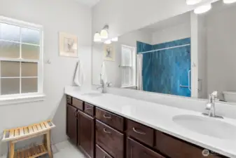 Large counter space with this double vanity in the primary bathroom