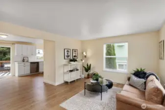 Nice floor plan with living room open to kitchen. Neutral tones and easy case laminate floors.
