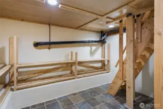 Stairs leading down to the custom basement buildout.