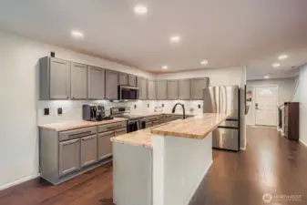 Open concept kitchen/living/dining