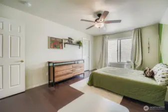Spacious upstairs bedroom with walk in closet