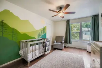 Spacious upstairs bedroom with walk in closet