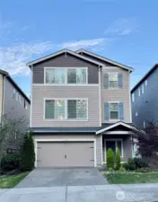 Charming front of home with welcoming curb appeal.
