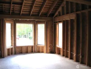 Living Room enjoys a bay window that captures the maximum amount of Northwest light