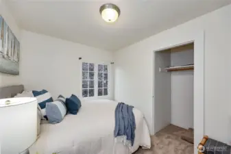 #4 Cozy bedroom with a window on the East side of the building.