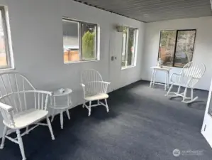 Enjoy an extra 183 sq ft of space, in the sun-filled sunroom.