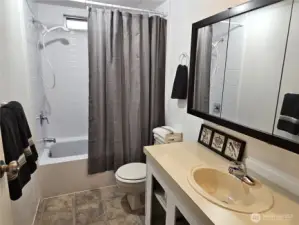 Main bath conveniently located off the hall for easy access.