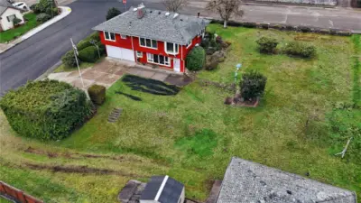 Ample parking and space for RV! Did you catch the stone and brick fire pit?