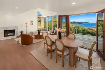 Open-concept living and dining area with abundant natural light and seamless indoor-outdoor flow.