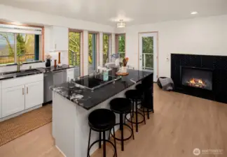 Additional kitchen view with sleek finishes, generous counter space, and open layout.