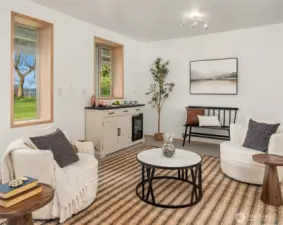 Stylish sitting room with fireplace, clean lines, and a warm, inviting atmosphere.