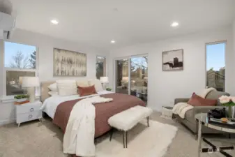 Each primary suite sports a spacious closet, deluxe walk-in rain shower, dual-sink vanity, designated W/D closet for convenient laundry, and a private balcony (for homes A&B only). Photos of model home with similar layout, fit & finishes.