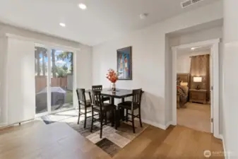 A spacious dining area leads to the back yard.