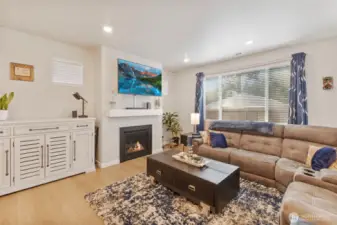 The living space has a cozy fireplace for those gray days and chilly nights.