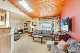 Living room adjacent to kitchen area