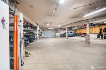 Secure, one car garage parking. The unit can store within the lines to the back wall. Outside the white lines is community storage. In the garage is also a community freezer that owners can use for extra storage.