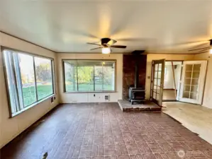 Looking toward the extra front entry with French doors to living room.