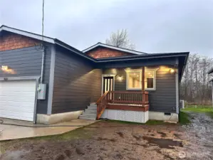 Covered porch  2 car Garage