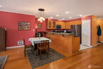 Dining room and kitchen with granite eating bar