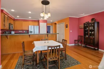 Dining room and kitchen with granite eating bar
