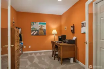 Spacious den/office conveniently right off the entry
