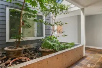Open air vestibule leading to the condo