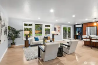 Enter into the open concept dining and living area