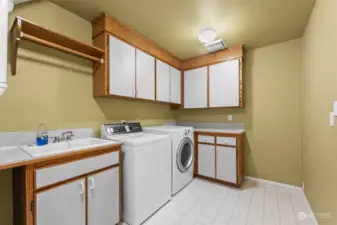 Main floor laundry room adjacent to the garage