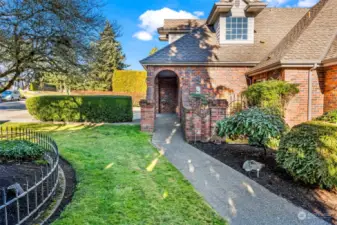 Lovely walkway from the front walk to the driveway