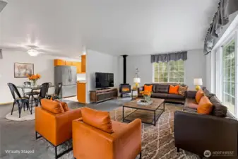 Virtually staged upper family room.