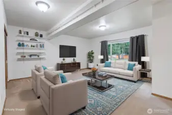 Virtually staged lower flex room.