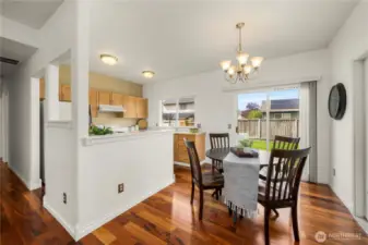 Dining flows into the charming kitchen