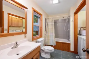 Main floor bath with washer and dryer