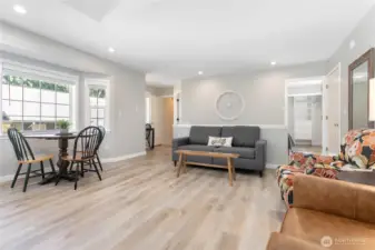 Door on right enters ADU bedroom, doors on left go to bath and entry.