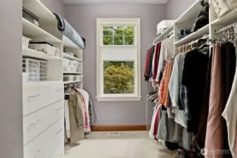 The main level primary bedroom's huge walk in closet.