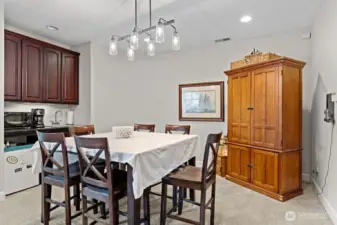 The upper level kitchen and dining area.