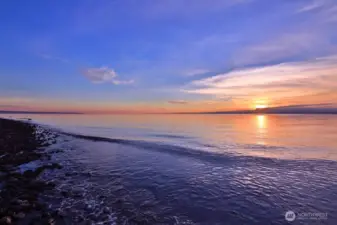 Enjoy ever changing sunsets year-round from the community beach.