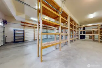 Tandem 6-car garage - extra-wide 3rd bay is 10'x8', perfect for storing your boat between outings on nearby Lake Tapps! Workshop is behind the 3rd bay