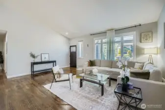 Bright & Elegant front living room with vaulted ceilings