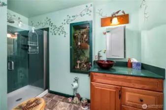 Upper-level guest bathroom with some very cool eclectic features
