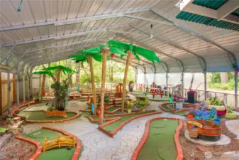 And then there is the putt putt golf, lot of thought and detail. Structure (#2) measures approximately 28' X 31' and if golf not your game would make a great shop or covered storage facility.