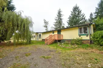 Home and shop on large lot! Backs to greenbelt.